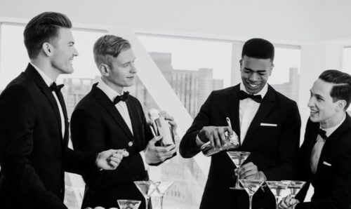 PTL Events Brand Imagery - Four Men Wearing Tuxedos and Smiling